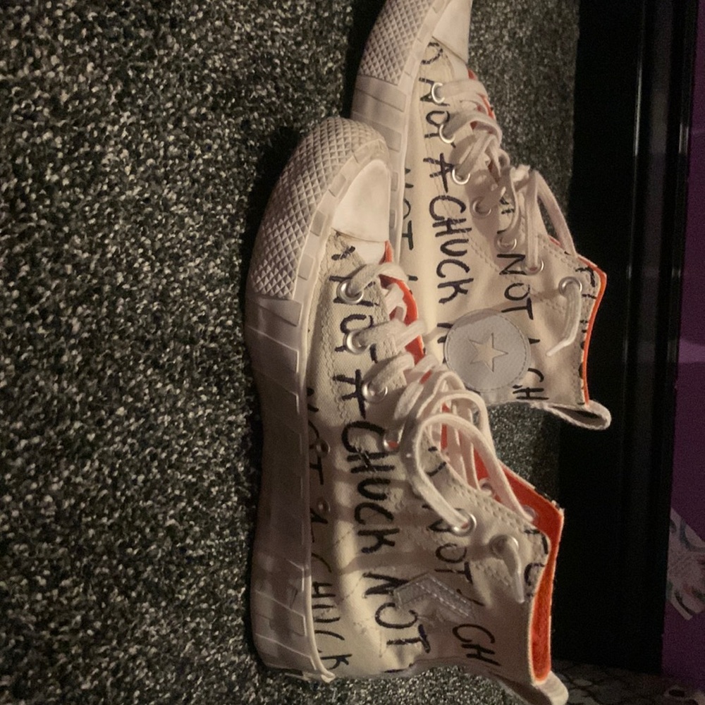 cream converse with orange inside and bottom size 5 in you at 7 in women